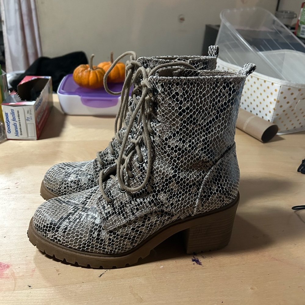 Women’s size 8 boot. Animal skin pattern. Almost brand new.